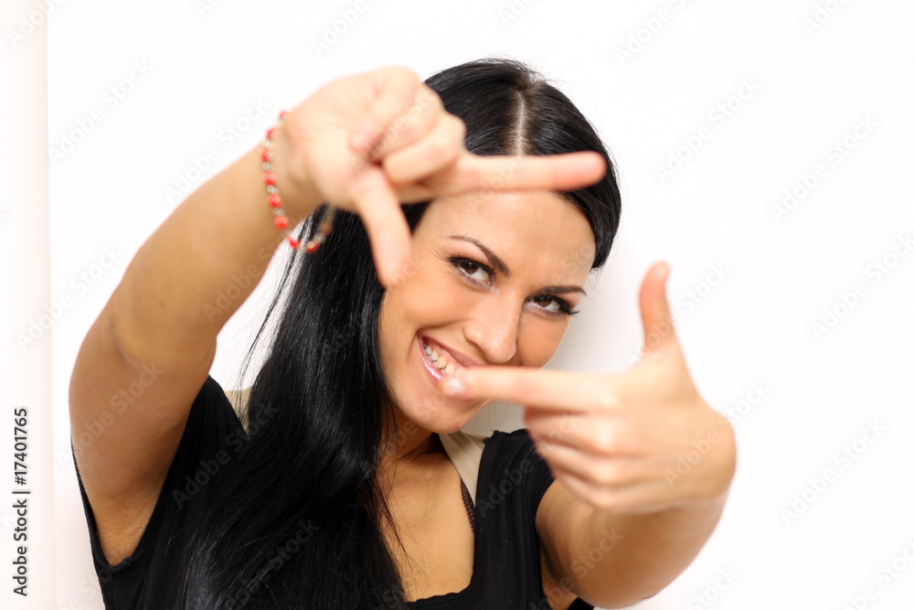 funny woman making photografing sign standing indoors funny woman making photografing sign standing indoors