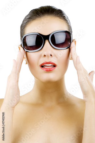 woman holding her sunglasses © Viorel Sima