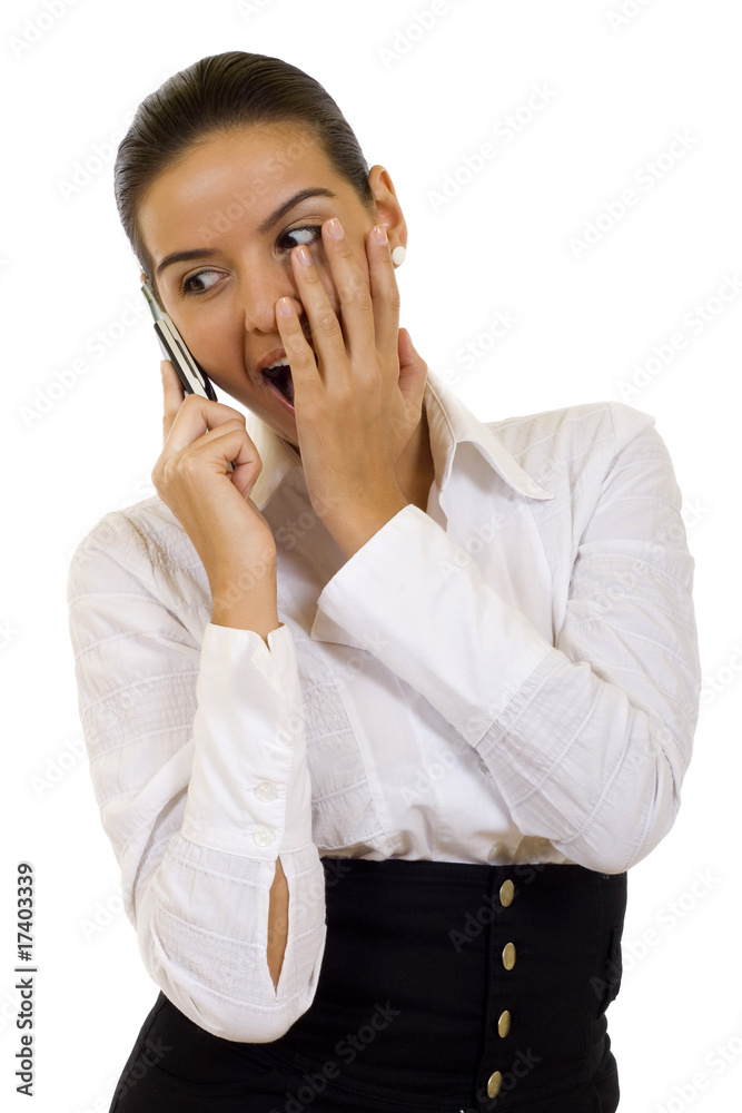 attractive businesswomanon phone looking shocked attractive businesswomanon phone looking shocked