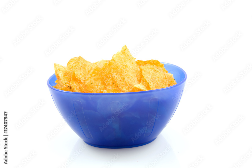 potato chips Bolognese in blue bowl over white background potato chips Bolognese in blue bowl over white background