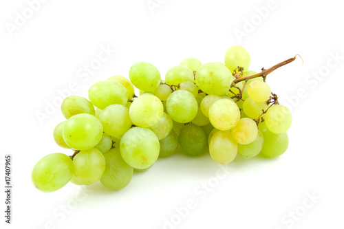 cluster of fresh white grapes over white background