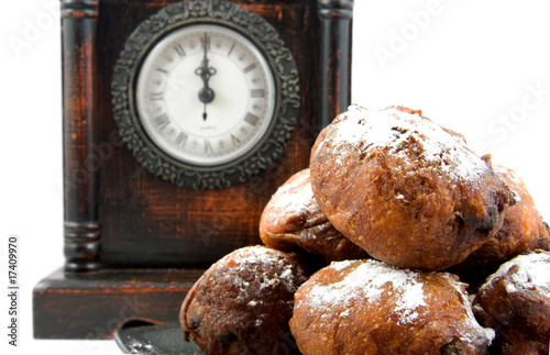 Dutch donut oliebollen over white background photo