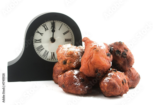 dutch oliebollen withe clock photo