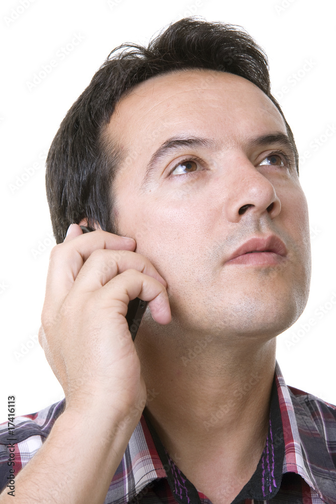 Young casual man using cellphone isolated on white Young casual man using cellphone isolated on white