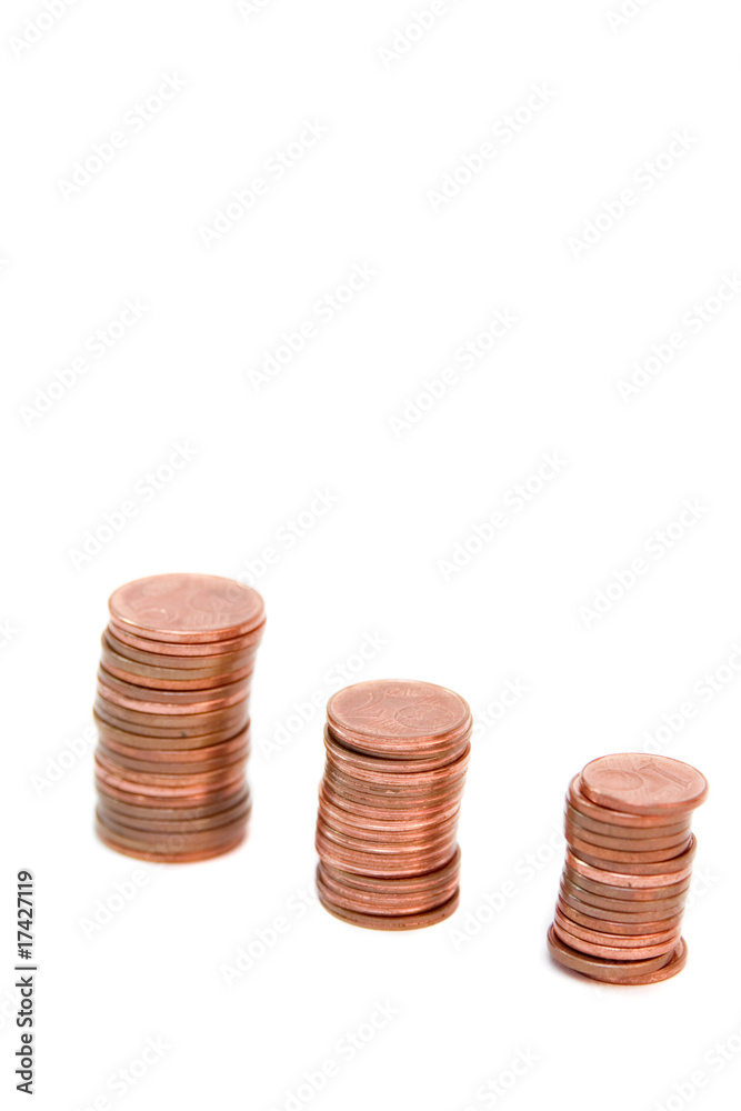towers of golden coins isolated on white towers of golden coins isolated on white