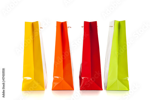 multi colored shopping bags on a white background