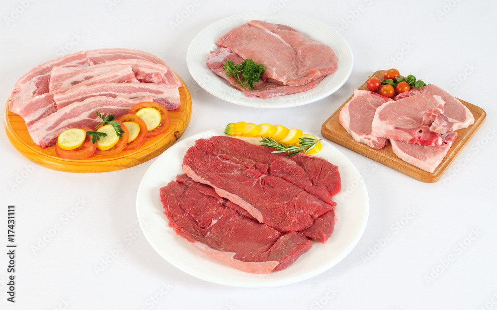 Variety of raw meat.