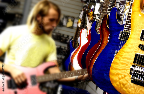 Man at guitar store