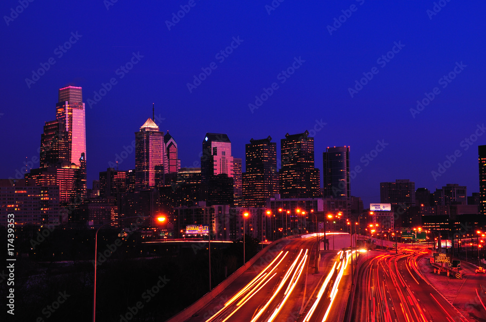 Philadelphia Skyline at night with traffic light streaks