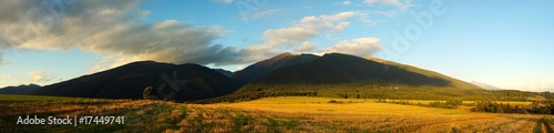 Panorama of mountain fields and meadows