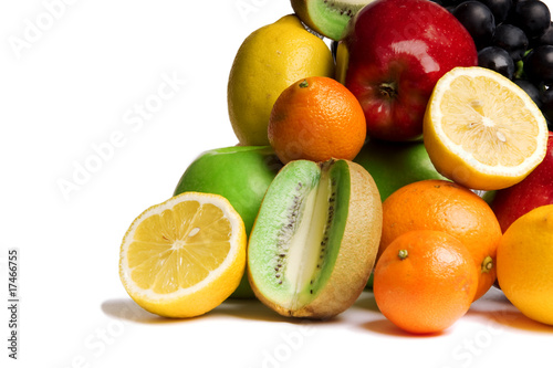 great number of bright and juicy fruit on a white background