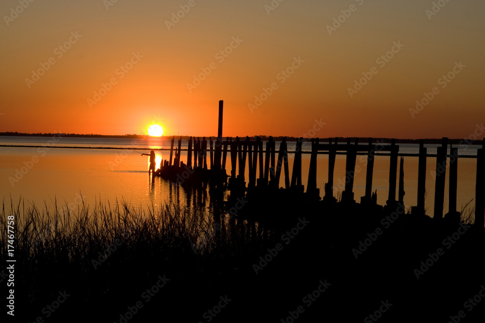 Fisherman At Sunset