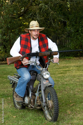 Redneck Motorcyle Riding with a Shotgun