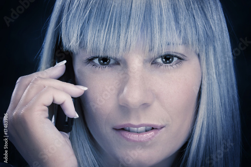 Seductive woman making a phonr call