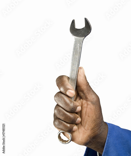 African hand with spanner