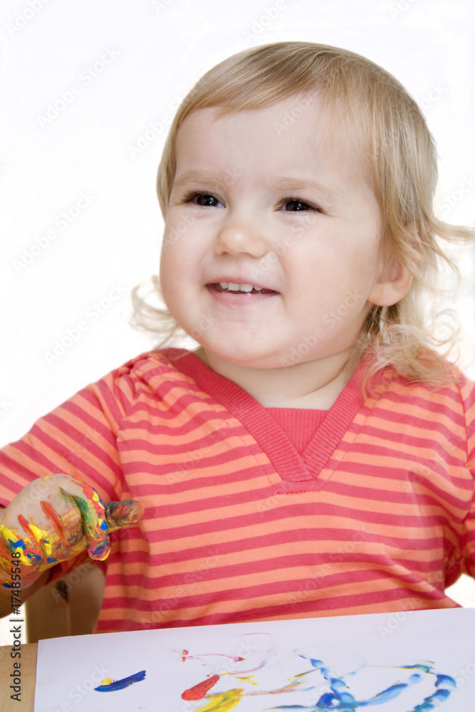 Laughing baby girl drawing fingerpainting Laughing baby girl drawing fingerpainting