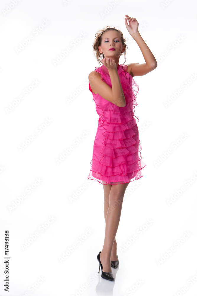 Young Emotional Woman In a Pink Dress