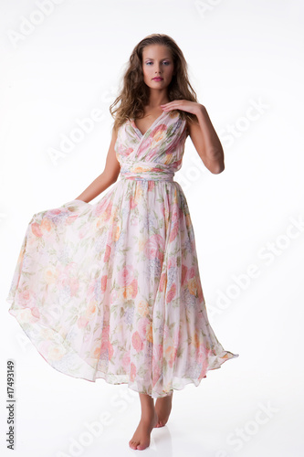 Young Emotional Woman In a Pink Dress