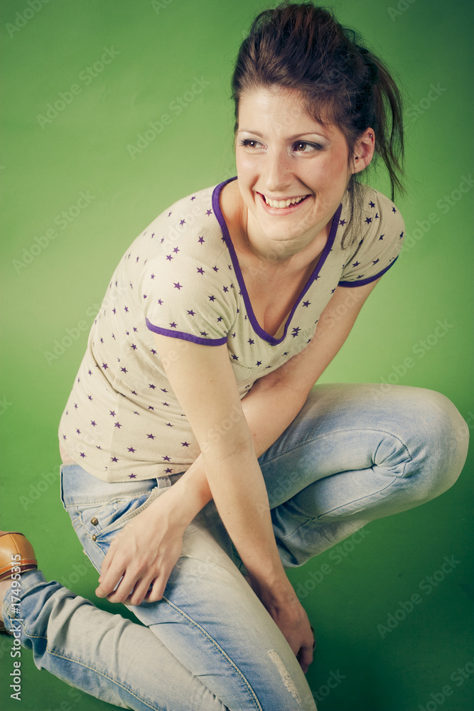 smiling young woman brunette on green background smiling young woman brunette on green background