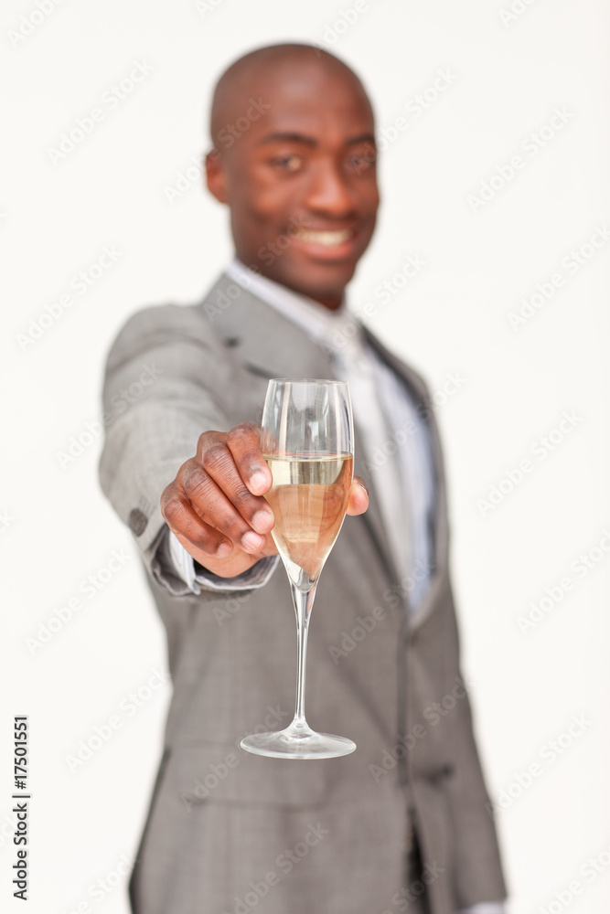 Ethnic businessman celebrating a success with champagne