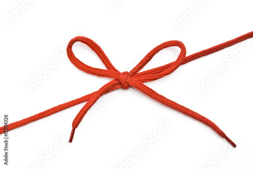 Red shoelace with bow photo