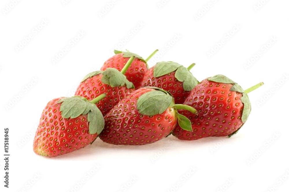 Strawberries forming a triangle over white background Strawberries forming a triangle over white background
