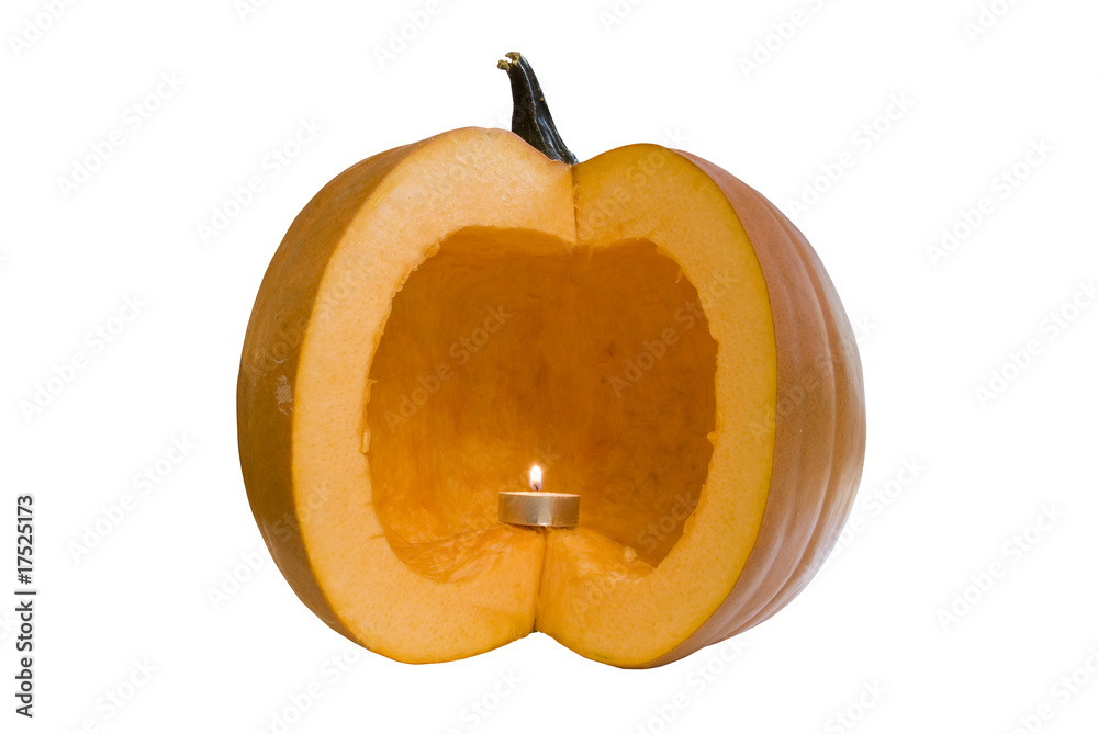 Naklejka premium Hollow pumpkin with candle inside