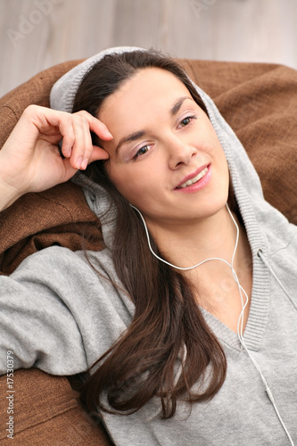 Relaxing with music.