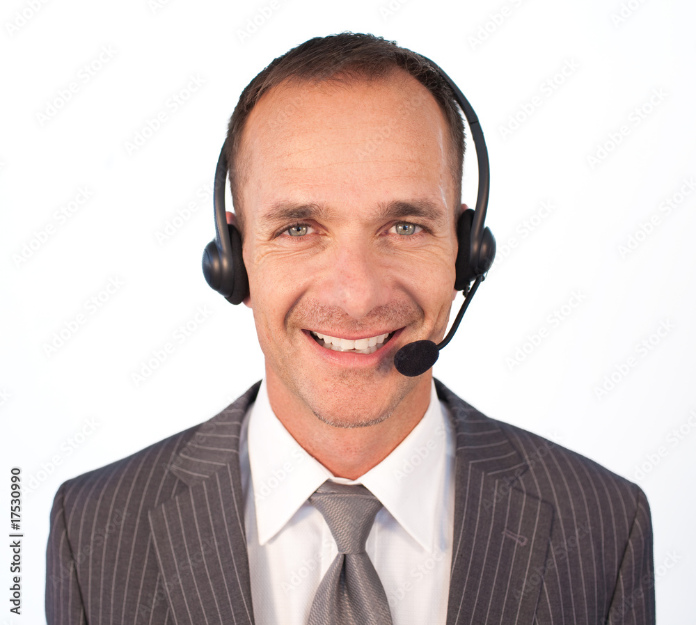 Smiling businessman with a headset on