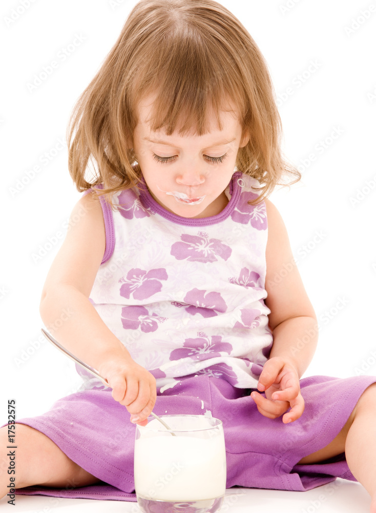 little girl with yogurt