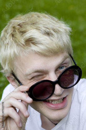 portrait blond man in funny sun glasses