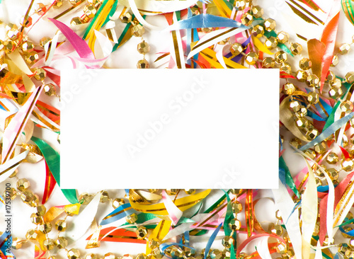 Blank gift card around colored confetti. Shallow DOF.