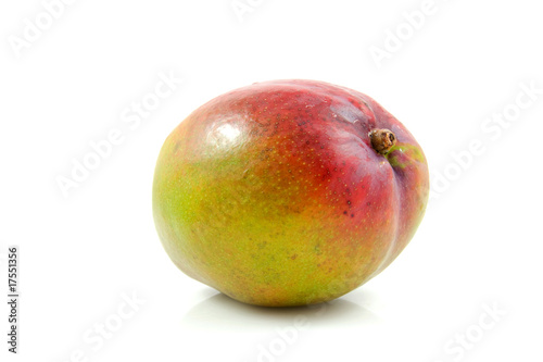 Fresh mango fruit over white background