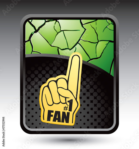 Fan hand on green cracked background