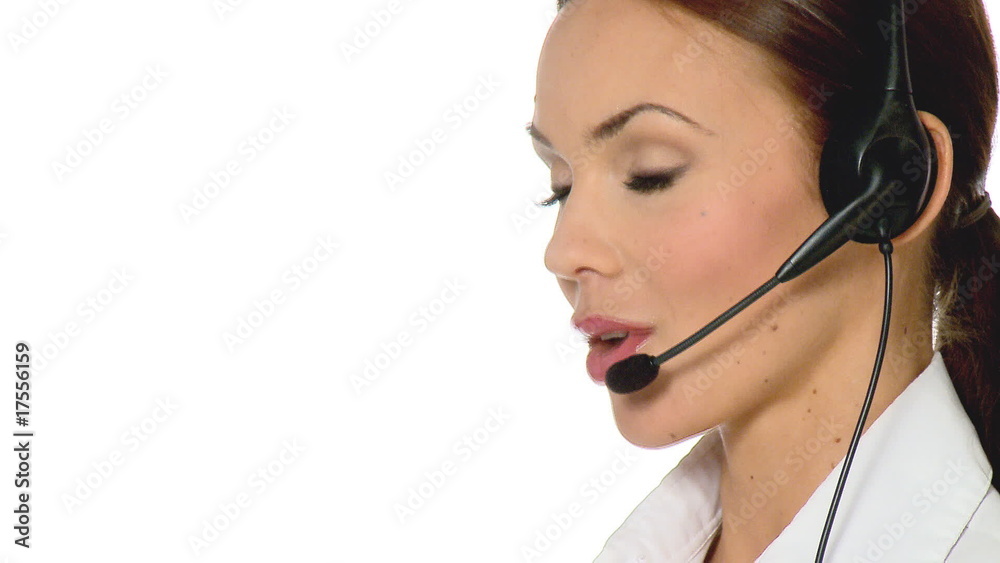 Beautiful young businesswoman is wearing headset Beautiful young businesswoman is wearing headset