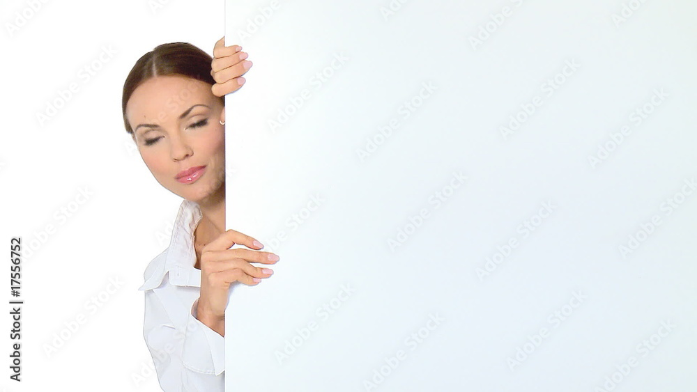 Beautiful business woman holding empty white board Beautiful business woman holding empty white board