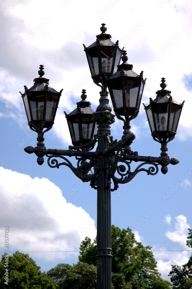 Street lamp on cloudy sky