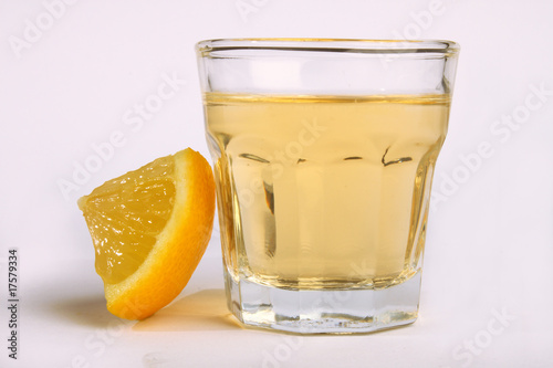 Tequila shot with lemon