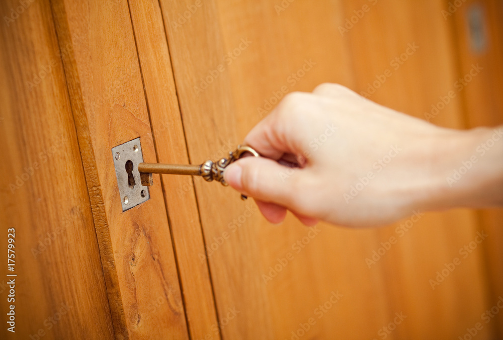 ouvrir porte cacher secret clé clef serrure meuble Stock Photo | Adobe Stock
