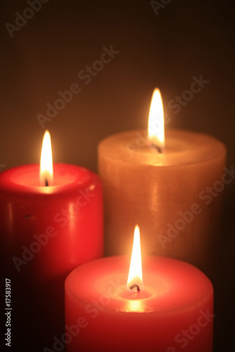 group of three burning candles