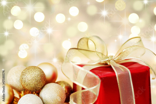 Christmas gift on defocused lights background