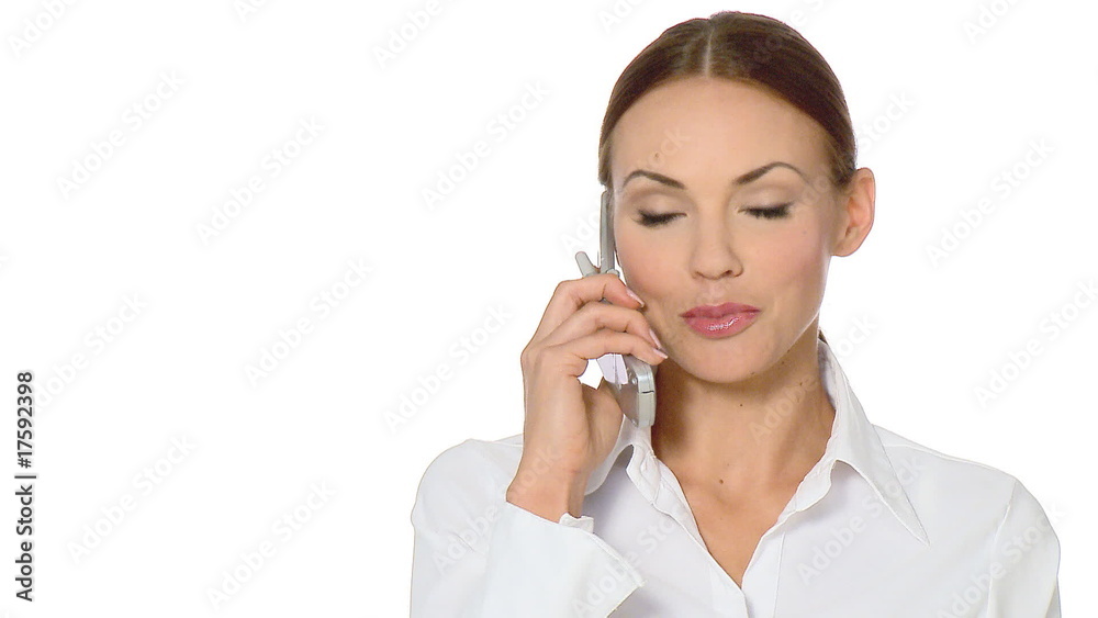 Beautiful young businesswoman is using mobile phone Beautiful young businesswoman is using mobile phone