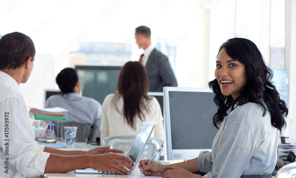 Businesswoman smiling in a presentation Businesswoman smiling in a presentation