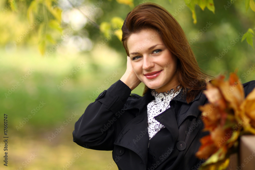 Beautiful woman with diadem made from yellow maple leaves . Beautiful woman with diadem made from yellow maple leaves .