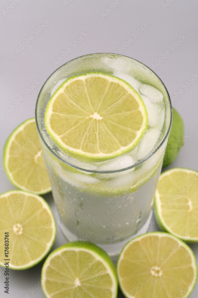 Lime drink and ripe limes Lime drink and ripe limes
