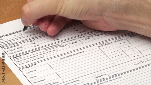 Filling out application for employment - HD