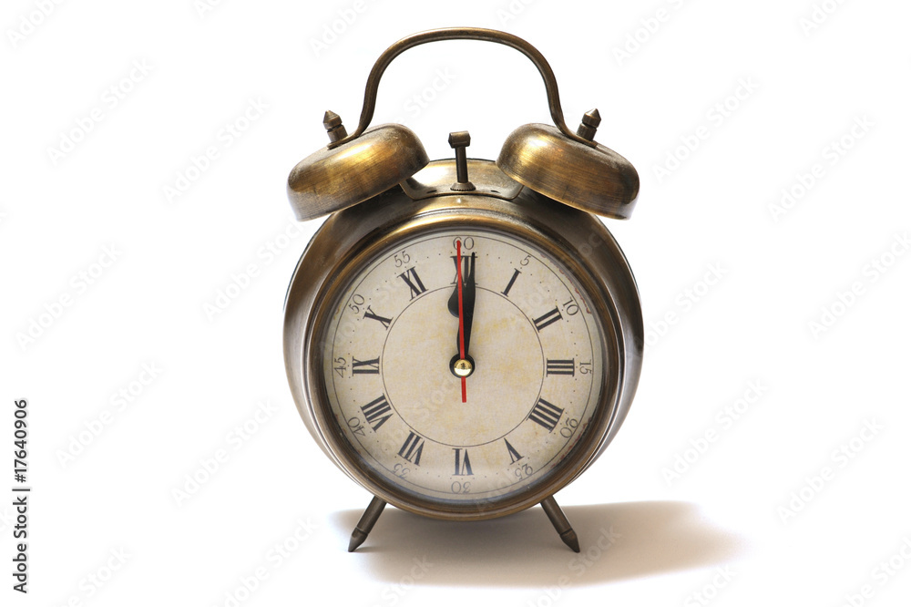Old-fashioned and antique clock with a big bells Old-fashioned and antique clock with a big bells