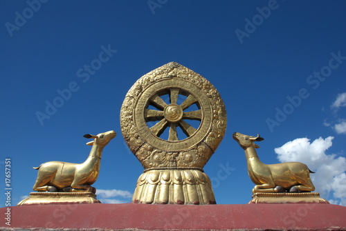 holy symbol on Tibetan temple roof