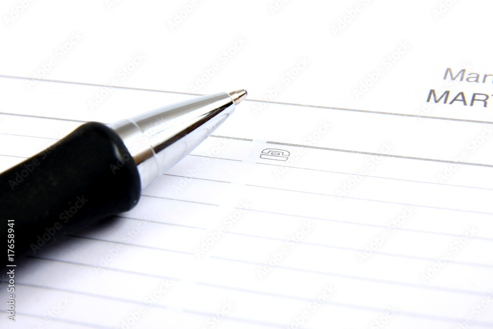 agenda and ball pen