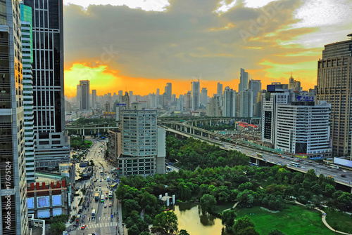 China Shanghai yan an road and city skyline at sunset photo